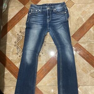 Mid rise boot miss me jeans,dark wash size 30.